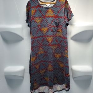 LulaRoe dress, dark grey with patter in black, maroon, and yellow. Size Medium.